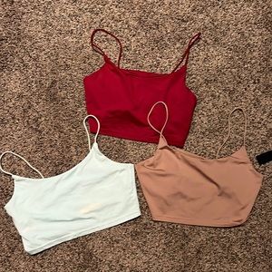 Three size small cropped tank tops. Multicolor.